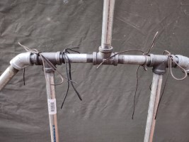armor stand made of steel pipe and fittings.