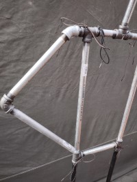 armor stand made of steel pipe and fittings.