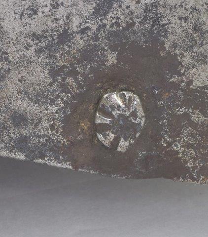 Original 16th c. rivet on armour