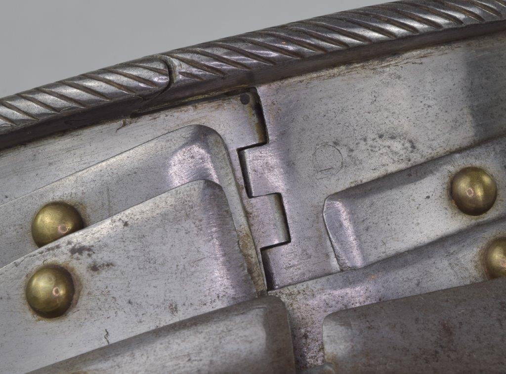 gorget details showing the uppper plate, roll, hinges and pins